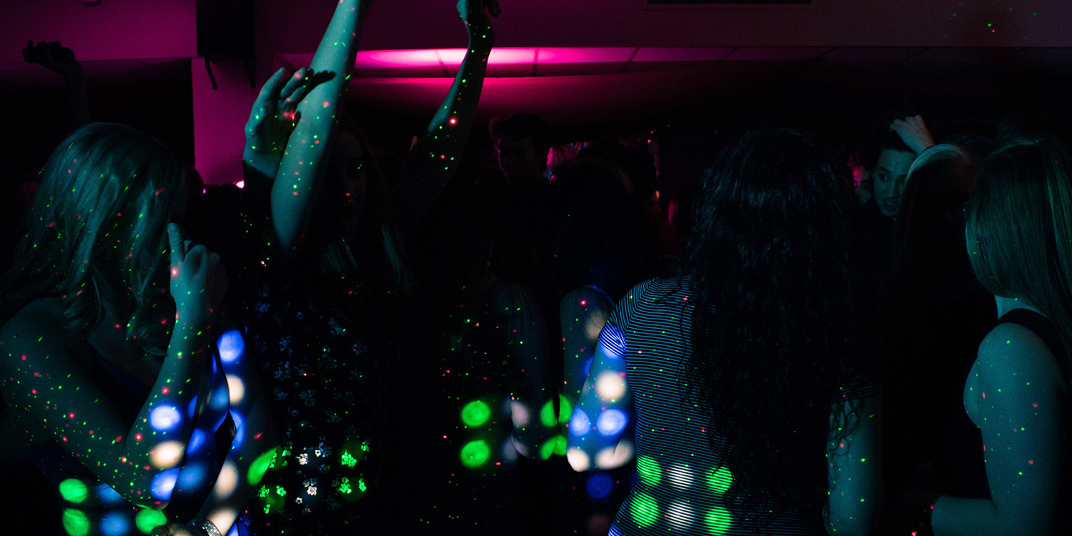 image of people dancing in flickering party lights